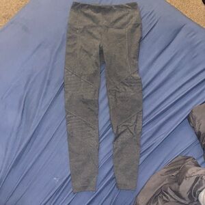 Size small grey leggings with textured on legs (featured in pictures)